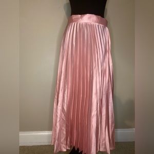 Soft pink pleated maxi skirt.
